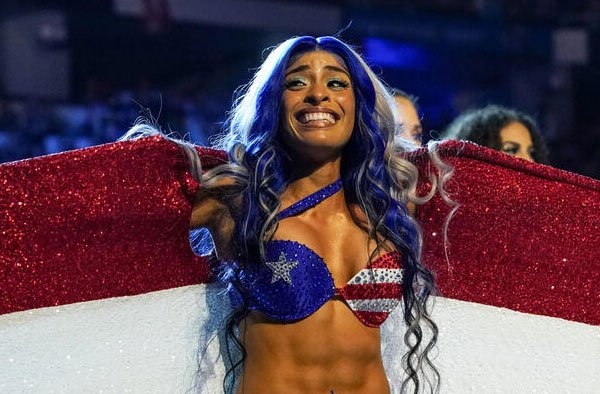 Zelina Vega (Thea Megan Trinidad Büdgen)